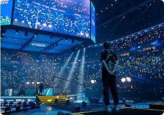 Esports tournament arena lit up for a match